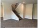 Spacious living space showcasing staircase with carpeted floor, grey walls, and natural lighting at 3383 Milan Ct # 4 Plapprox Sqft 1, Douglasville, GA 30135