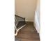 Carpeted staircase featuring wood and wrought iron railing at 3383 Milan Ct # 4 Plapprox Sqft 1, Douglasville, GA 30135