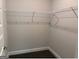 Walk-in closet features carpet flooring and white wire shelving at 3383 Milan Ct # 4 Plapprox Sqft 1, Douglasville, GA 30135
