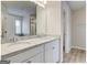 Bright bathroom featuring double vanity, stone countertops, and modern fixtures, providing a luxurious feel at 300 San Anselmo St, Locust Grove, GA 30248