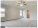 Large bedroom with neutral paint, carpet, windows with natural light and walk-in closet at 300 San Anselmo St, Locust Grove, GA 30248