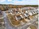Neighborhood aerial view highlighting homes, well-manicured lawns, and community layout at 103 Watercress Ct, Stockbridge, GA 30281