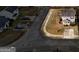 Aerial view of home showcasing the property's layout, driveway, yard, and neighborhood location at 103 Watercress Ct, Stockbridge, GA 30281