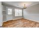 Dining room with natural light and classic chandelier at 103 Watercress Ct, Stockbridge, GA 30281