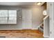 Foyer featuring hardwood floors, a staircase, and a white front door at 103 Watercress Ct, Stockbridge, GA 30281