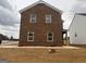 Two-story brick home featuring white trim and a well-maintained yard at 5301 Tolar Rd # 95, South Fulton, GA 30213
