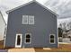 House exhibiting attractive gray siding, large windows, and a well-kept yard at 5301 Tolar Rd # 95, South Fulton, GA 30213