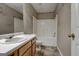 Bathroom with a vanity, toilet, and a shower-tub combo at 131 Turning Pt, Stockbridge, GA 30281