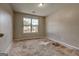 Bedroom with a large window offering outdoor views at 131 Turning Pt, Stockbridge, GA 30281