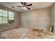 Bedroom with a ceiling fan and natural light streaming through the window at 131 Turning Pt, Stockbridge, GA 30281