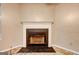 A close-up view of the fireplace with a white mantel, showing its design and presence in the room at 131 Turning Pt, Stockbridge, GA 30281