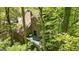 Backyard deck provides an inviting outdoor space with nature views at 2451 Cedar Fork Trl, Marietta, GA 30062