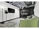 Finished basement featuring a casual seating area and entertainment setup at 2451 Cedar Fork Trl, Marietta, GA 30062
