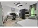 Bedroom featuring a cozy bed, modern furnishings, workstation, and soft rug at 2451 Cedar Fork Trl, Marietta, GA 30062
