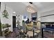 Elegant dining area with glass top table, seating for four, and decorative lighting at 2451 Cedar Fork Trl, Marietta, GA 30062