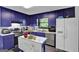 Bright kitchen featuring modern appliances, tile backsplash, and ample counter space at 2451 Cedar Fork Trl, Marietta, GA 30062