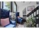 Inviting interior with comfortable armchairs, stylish décor, and staircase at 2451 Cedar Fork Trl, Marietta, GA 30062