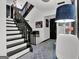 Bright staircase with black trim and unique decor for an eye-catching design at 2451 Cedar Fork Trl, Marietta, GA 30062