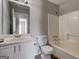 Bathroom with shower and tub combination, single sink, and tile flooring at 3612 River Mill Ct, Ellenwood, GA 30294