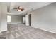 Neutral bedroom features a trey ceiling with fan, carpeting, and ample square footage at 3612 River Mill Ct, Ellenwood, GA 30294