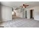 Bedroom features neutral walls, plush carpet, high ceiling, closet space, and ample square footage at 3612 River Mill Ct, Ellenwood, GA 30294