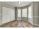 Bright nook featuring three windows, closet, and access to kitchen at 3612 River Mill Ct, Ellenwood, GA 30294