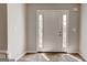 Front door to the home's entryway featuring sidelights at 3612 River Mill Ct, Ellenwood, GA 30294