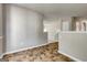 Hallway with access to other rooms and unique tile flooring at 3612 River Mill Ct, Ellenwood, GA 30294