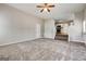 Bright, spacious living room that steps up to the kitchen area at 3612 River Mill Ct, Ellenwood, GA 30294