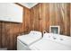 This laundry room features a full-size washer and dryer at 736 Stagecoach Rd, Stockbridge, GA 30281