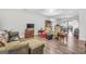 Cozy living room with hardwood floors and lots of comfortable furniture at 736 Stagecoach Rd, Stockbridge, GA 30281