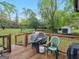 Enjoy the outdoors on the back deck with a view of the spacious yard at 121 Cotton Indian Trl, Stockbridge, GA 30281