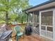 Cozy back deck is perfect for relaxing while looking at the backyard and shed at 121 Cotton Indian Trl, Stockbridge, GA 30281