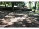 The backyard features mature trees and space for various landscaping options and personalization at 346 Schoen Se St, Atlanta, GA 30315
