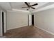 Bedroom features ceiling fan, carpeted floor, and trim at 10119 Commons Way, Jonesboro, GA 30238