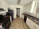Inviting kitchen with light cabinetry, sleek countertops, and modern appliances at 10119 Commons Way, Jonesboro, GA 30238