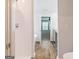 Bathroom featuring wood-look flooring and walk-in shower with tiled walls at 5318 Tolar Rd # 25, South Fulton, GA 30213