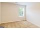 Bedroom featuring neutral carpet, white walls and a window with blinds at 5318 Tolar Rd # 25, South Fulton, GA 30213