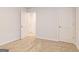 Bedroom featuring neutral carpet and white trim with an open doorway to another room at 5318 Tolar Rd # 25, South Fulton, GA 30213