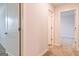 Hallway features neutral paint, carpet and white doors and trim at 5318 Tolar Rd # 25, South Fulton, GA 30213