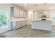 Open concept kitchen with island, stainless steel appliances, granite countertops, and hardwood floors at 5318 Tolar Rd # 25, South Fulton, GA 30213