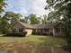 Exterior view of the home showcasing its design, landscaping, and curb appeal at 191 Tumlin Creek Rd # 1, Roopville, GA 30170