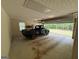 Garage with an old black truck inside at 191 Tumlin Creek Rd # 1, Roopville, GA 30170