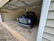 A vintage blue truck is parked inside this spacious two car garage at 191 Tumlin Creek Rd # 1, Roopville, GA 30170