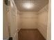 Walk-in closet with multiple wire racks, offering ample storage and organization at 191 Tumlin Creek Rd # 1, Roopville, GA 30170