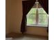 Window view showing a forest with natural light shining through trees at 191 Tumlin Creek Rd # 1, Roopville, GA 30170