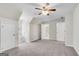 Large attic bedroom featuring neutral carpet and attached bath at 9055 Carroll Manor Dr, Sandy Springs, GA 30350