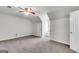 Large bedroom with neutral carpet, ceiling fan, walk-in closet and attic window seat at 9055 Carroll Manor Dr, Sandy Springs, GA 30350