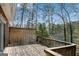 Wooden deck overlooking the lake, perfect for enjoying the nature and tranquility at 9055 Carroll Manor Dr, Sandy Springs, GA 30350