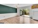 A bright dining area with hardwood floors and a sliding glass door to the outside patio at 9055 Carroll Manor Dr, Sandy Springs, GA 30350